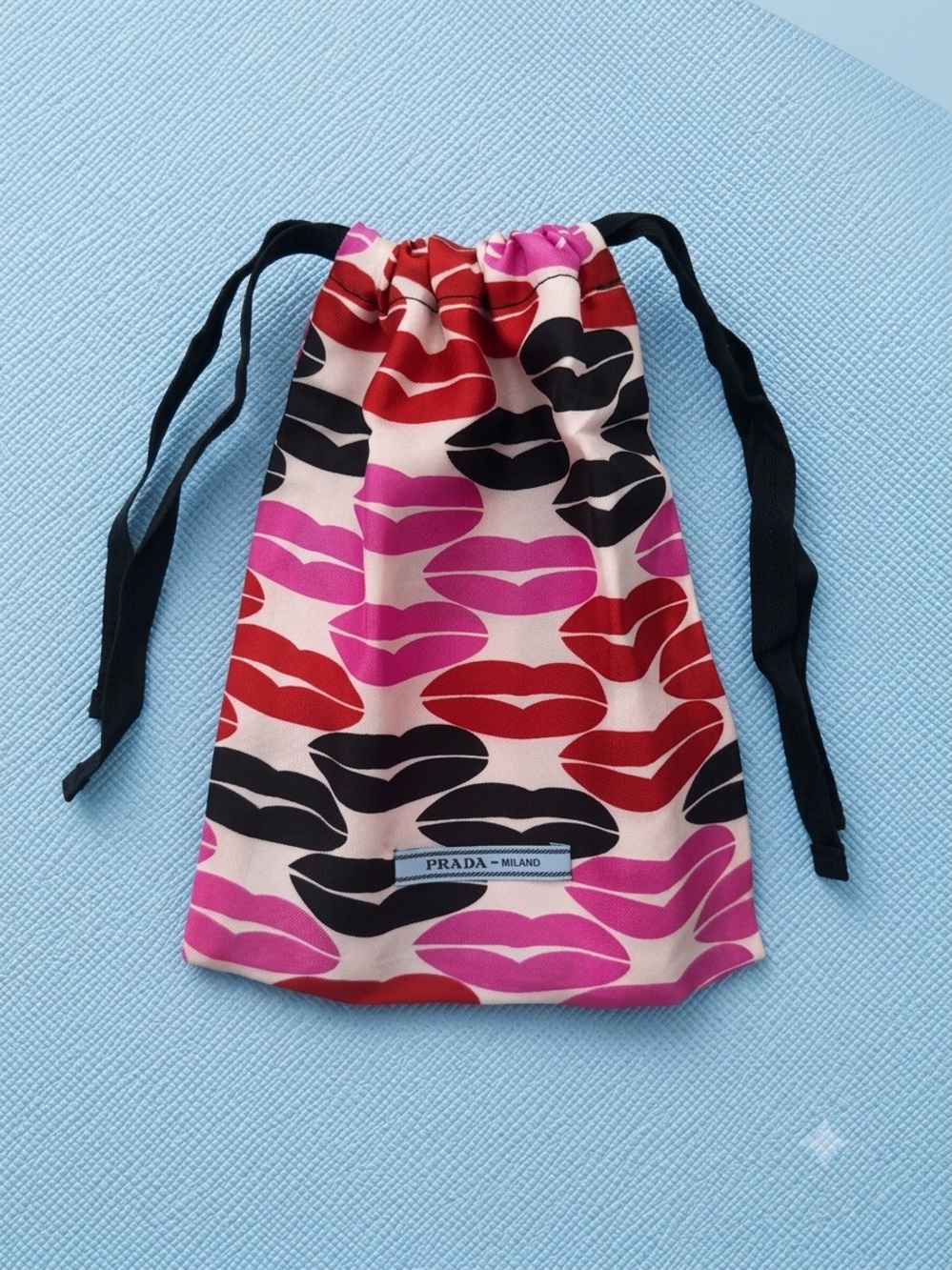 Prada Lip-Print Drawstring Pouch in Pink, Red & Black